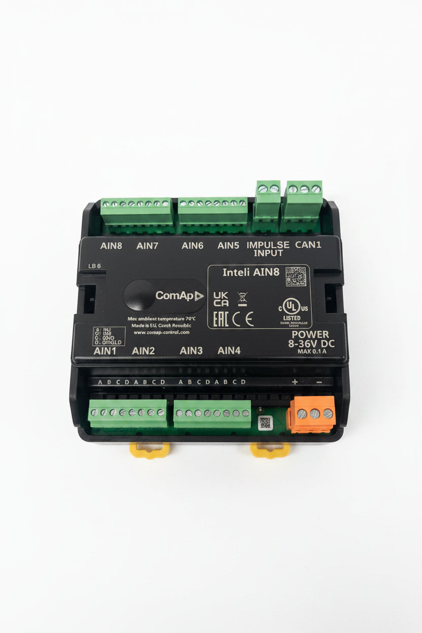 Electronic control module with various connectors on a white background